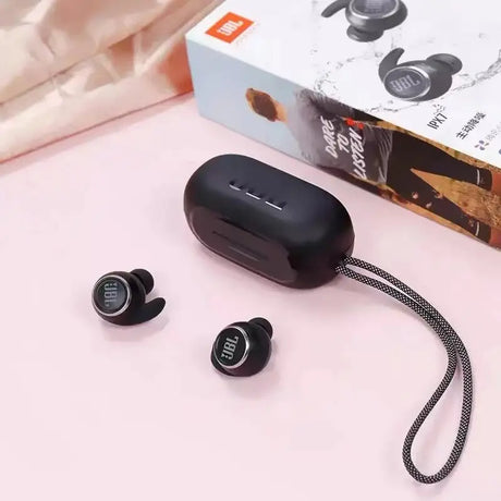 a pair of bluetooth earphones with a box