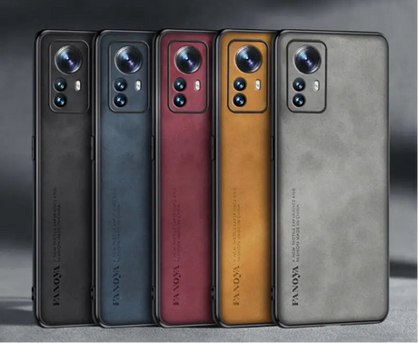 Five smartphones in different colors with prominent camera arrays.