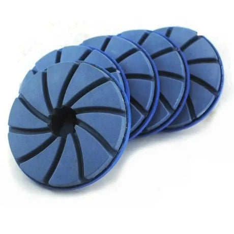 a set of blue foam discs