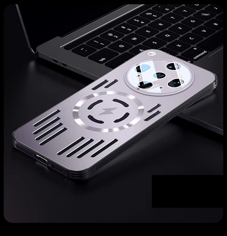 Silver smartphone case with a circular camera cutout and a magnetic charging ring.