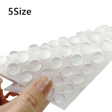 someone holding a plastic cup with a lot of bubbles on it