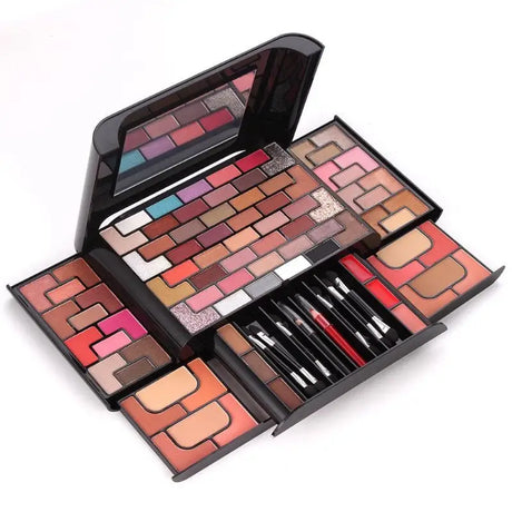 a makeup set with various colors and brushes