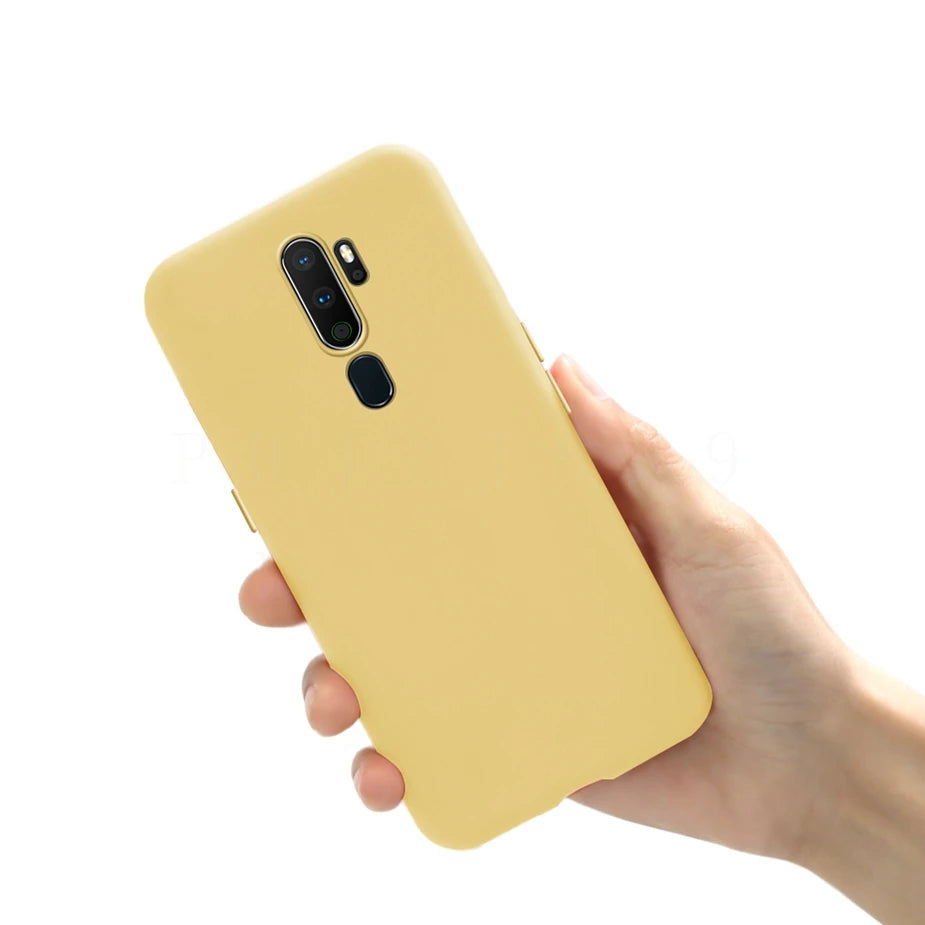Yellow smartphone with a triple camera and fingerprint sensor on the back.