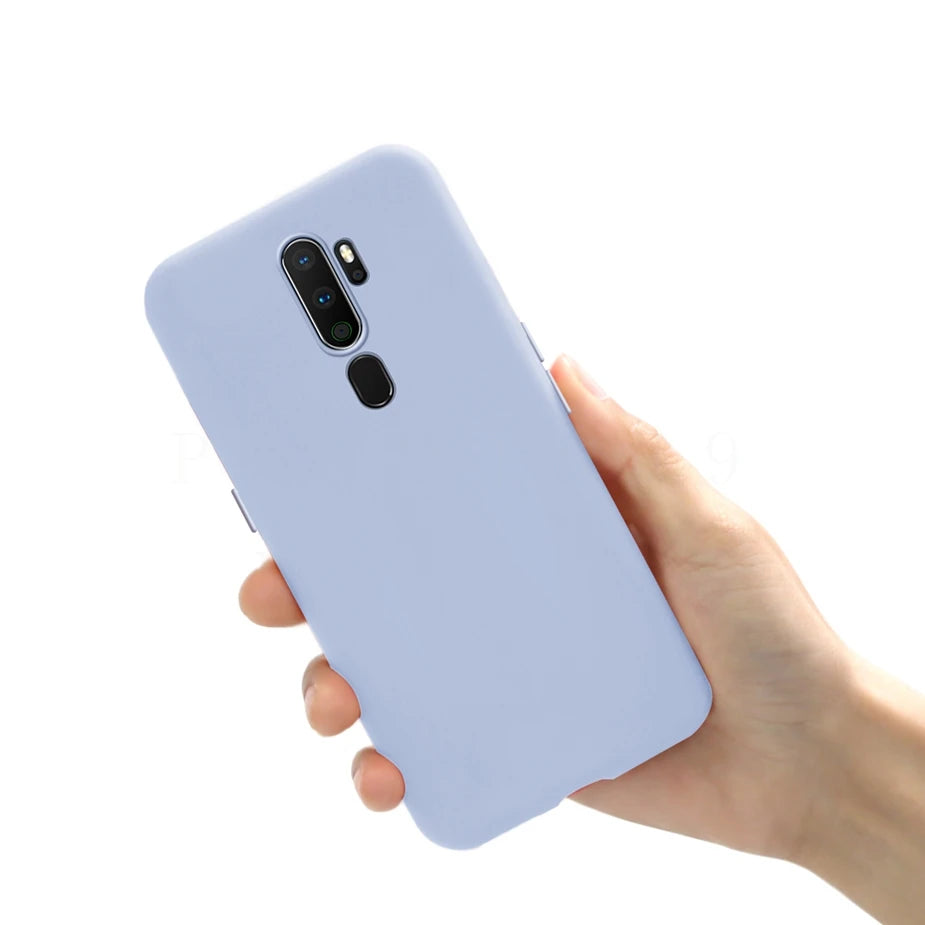 A light purple silicone phone case with cutouts for the camera and fingerprint sensor.
