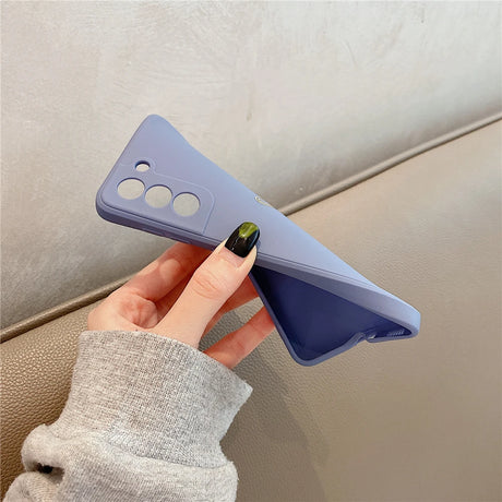 A flexible, lavender-colored silicone phone case with a soft inner lining and cutouts for multiple camera lenses.