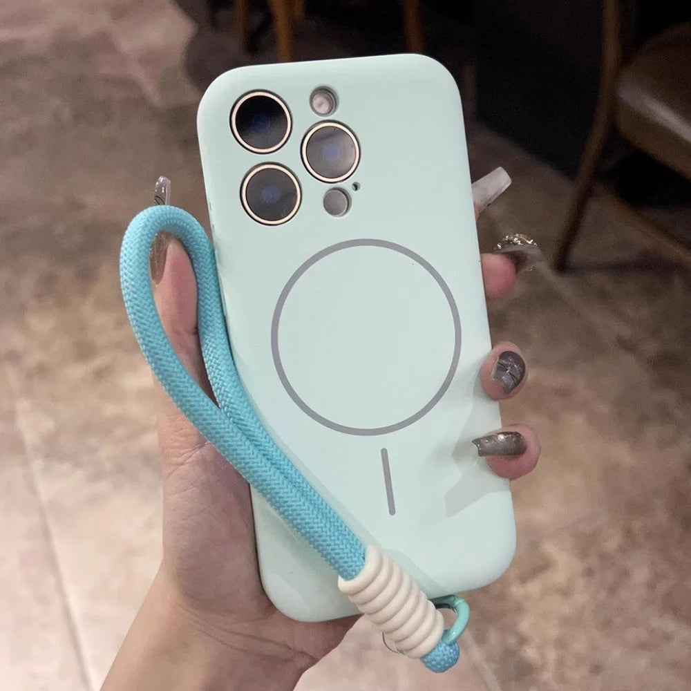 Light green silicone phone case with a blue lanyard and a magnetic charging ring.