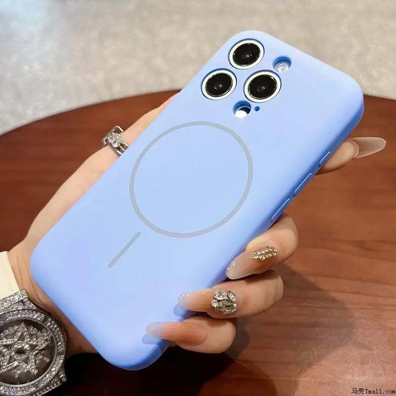 A light blue silicone phone case with a Magsafe ring and triple camera cutouts.