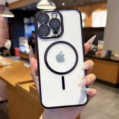 White iPhone with a black camera module and a MagSafe ring.