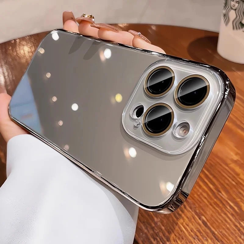 A metallic silver reflective phone case with three prominent camera cutouts and a clear lens protector.