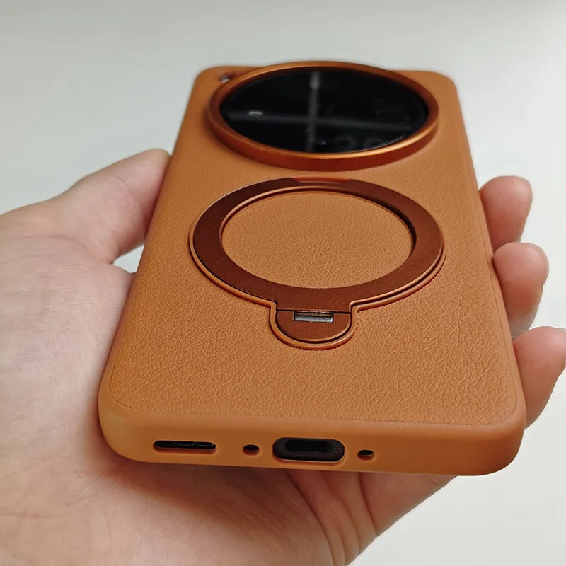 Brown smartphone case with a large camera cutout and a built-in magnetic ring stand.