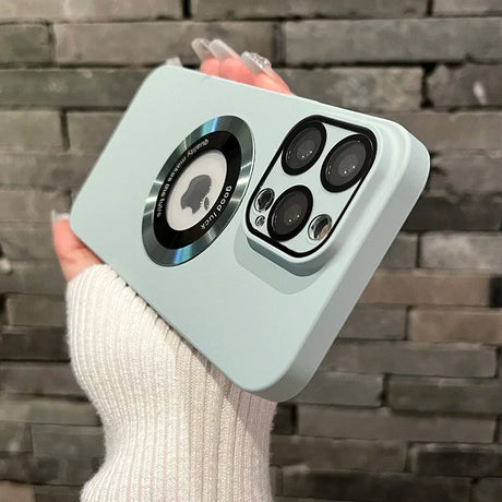 Light blue iPhone case with a magnetic ring and camera lens protection.