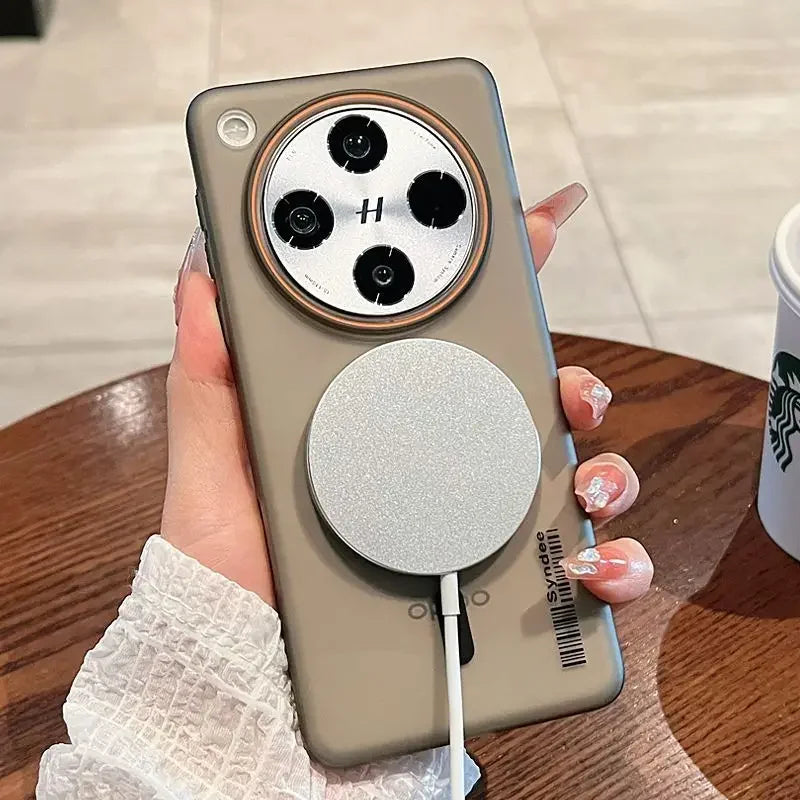 Khaki-colored smartphone case with a circular camera module and a silver magnetic wireless charger attached.