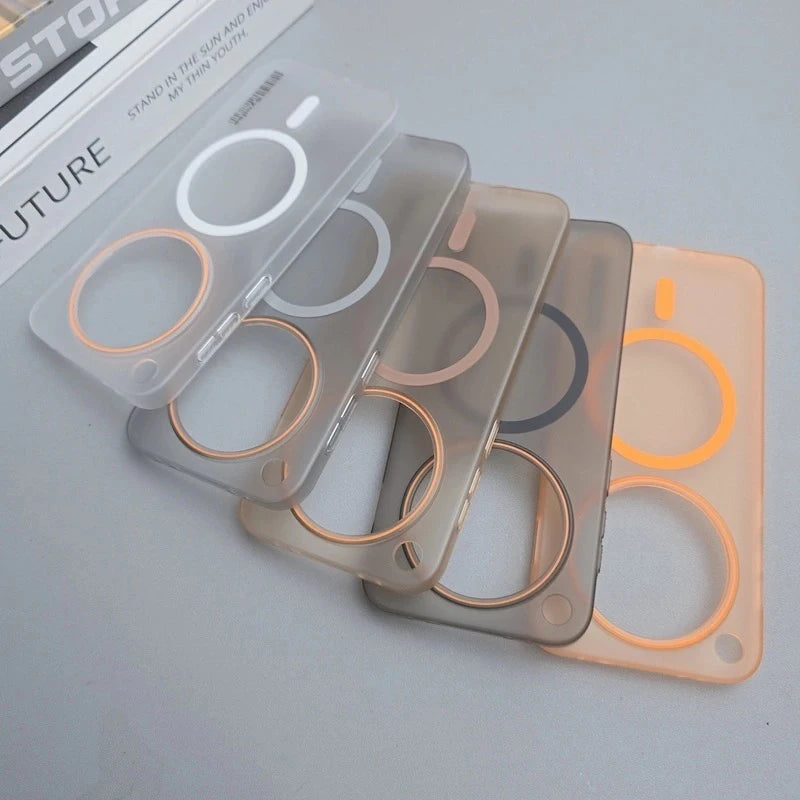 A stack of five translucent phone cases with circular accents in various colors.