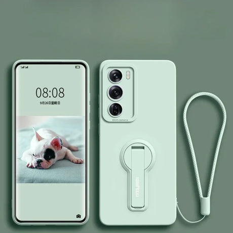 Mint green smartphone and matching case with a kickstand and wrist strap.
