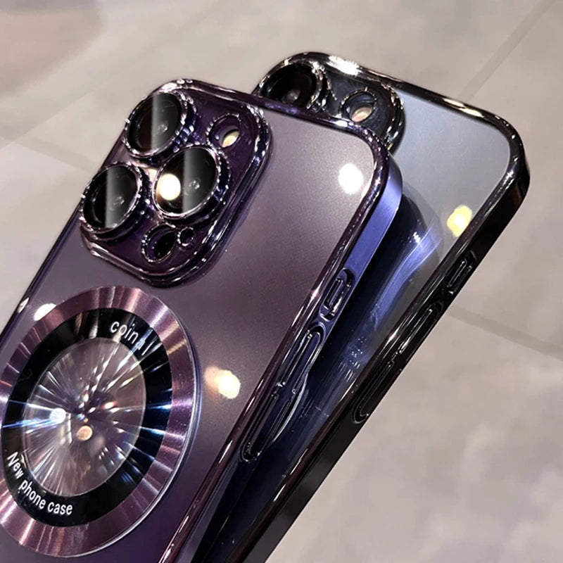 Two clear phone cases with iridescent purple accents and a circular magnetic ring.