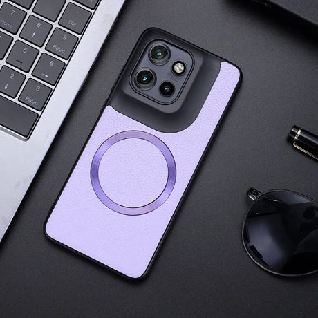 Purple smartphone case with a black camera module section and a circular magnetic ring.