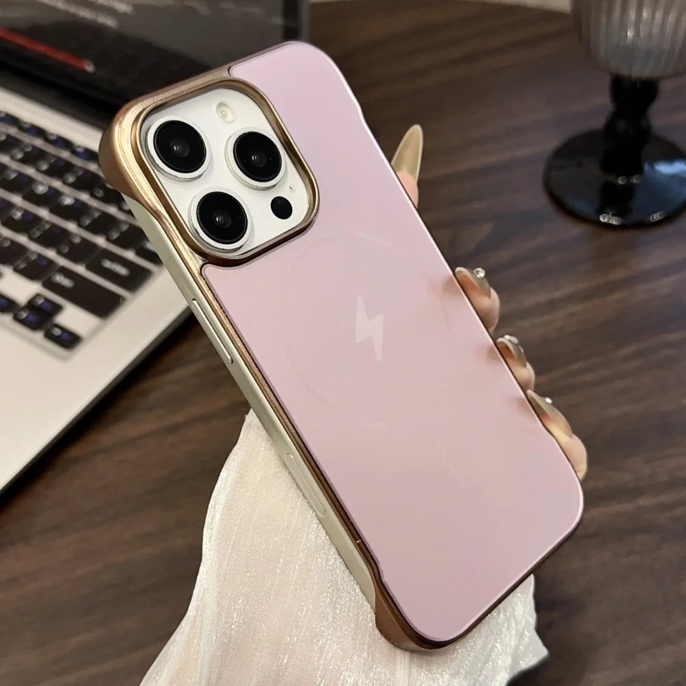 Pink smartphone with a gold-trimmed camera module and side bumper case.