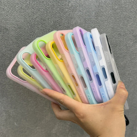 A stack of colorful, soft-shell phone cases.