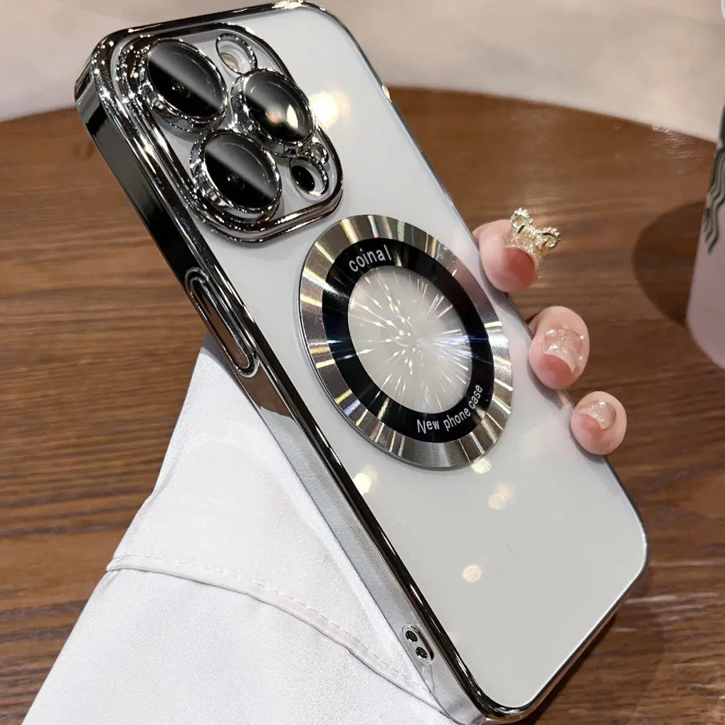 A clear phone case with chrome accents, a shiny camera protector, and an integrated magnetic ring stand.