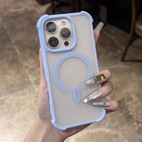Light blue and clear phone case with a Magsafe ring and camera lens protection.