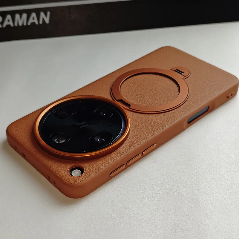 Brown leather-textured phone case with a large circular camera cutout and a built-in magnetic ring holder.