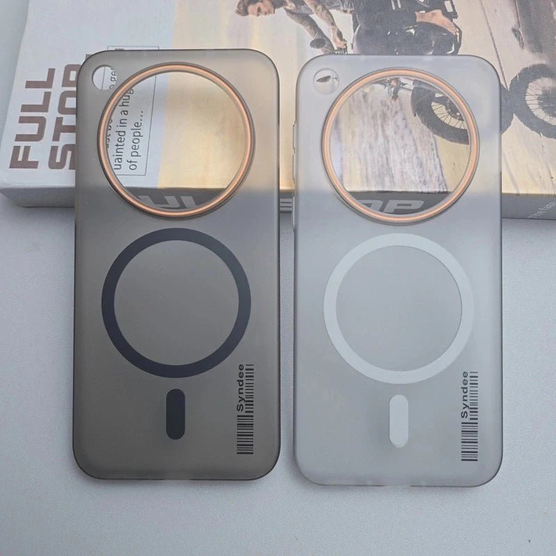 Two translucent phone cases with magnetic charging rings.