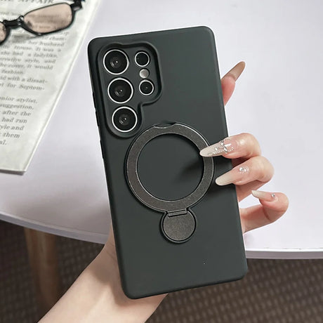 Black smartphone case with a built-in ring holder.