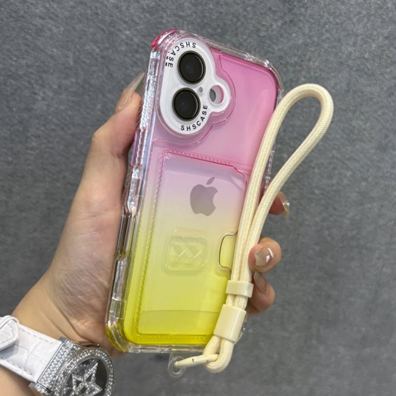 Clear, pink-to-yellow gradient iPhone case with a wrist strap and card slot.