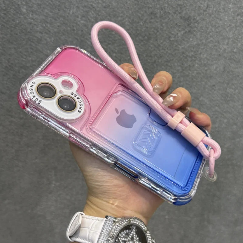 Pink and blue gradient transparent iPhone case with a wrist strap.