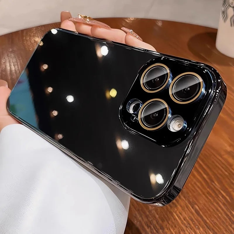 Glossy black smartphone with three camera lenses and gold accents.