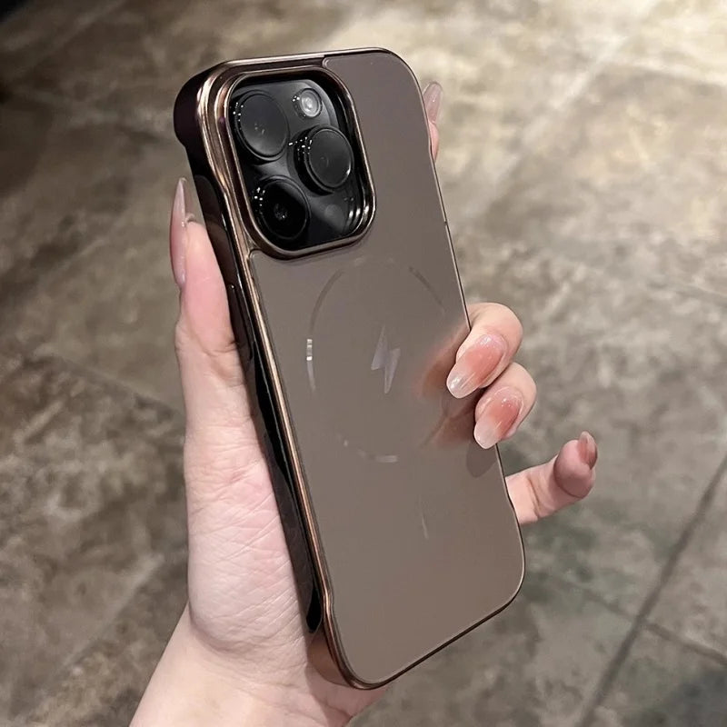 Rose gold iPhone with a clear, reflective case and visible MagSafe charging symbol.