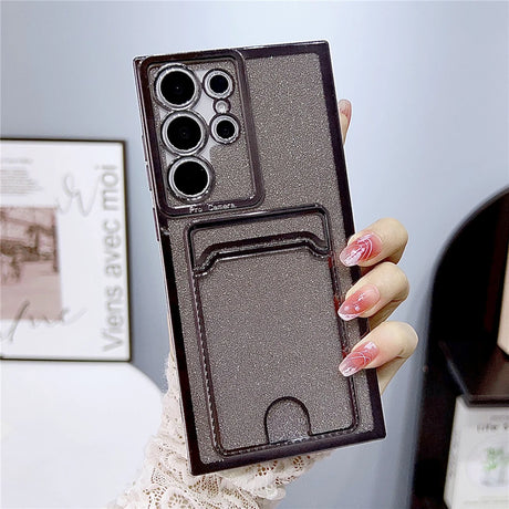 A glittery dark gray phone case with a camera protector and a card slot.