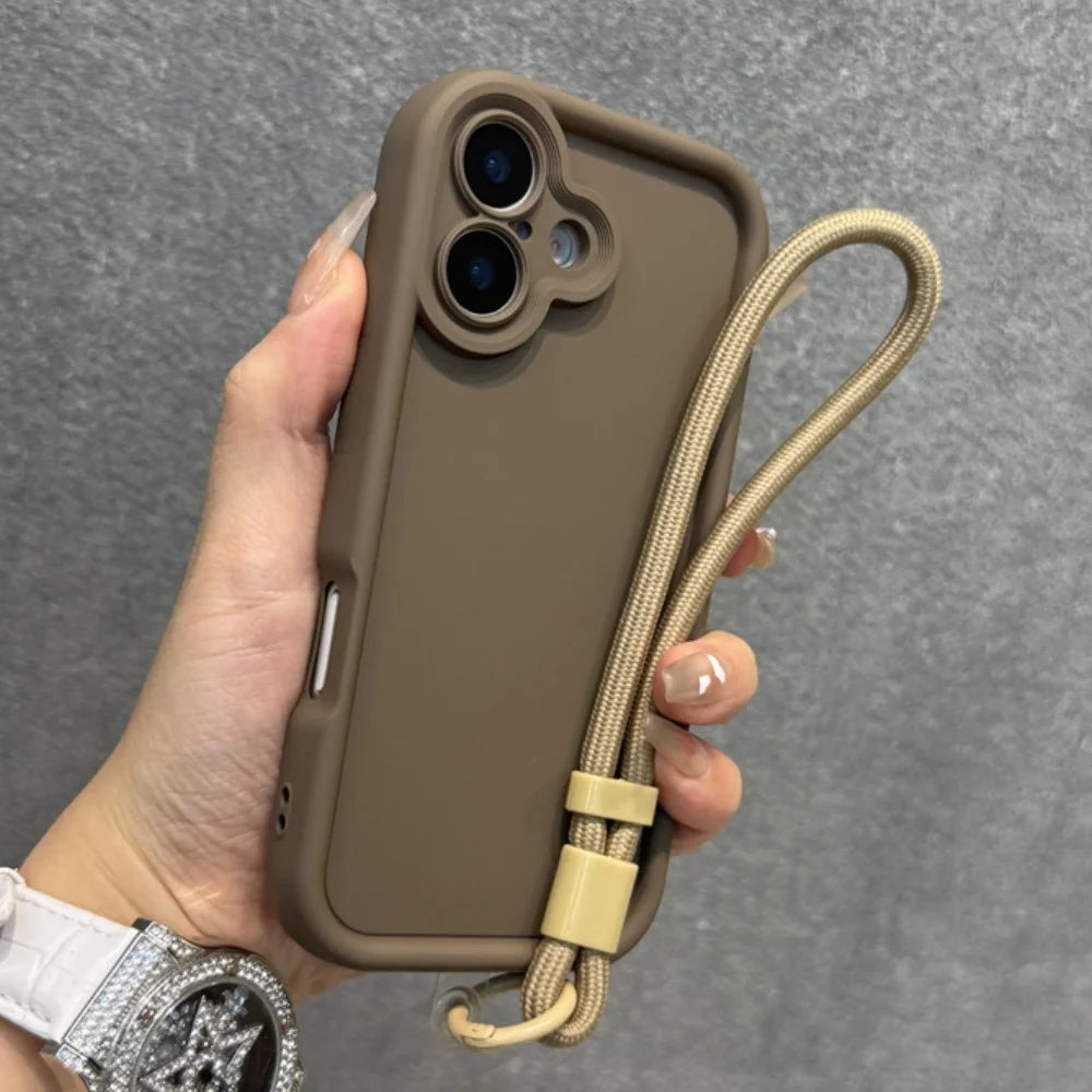 A brown smartphone case with a beige wrist strap and an opening for dual cameras.