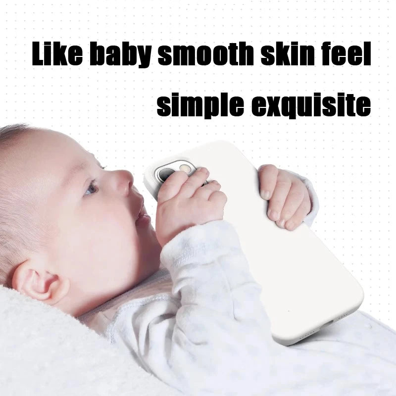 A baby holding a white phone case.