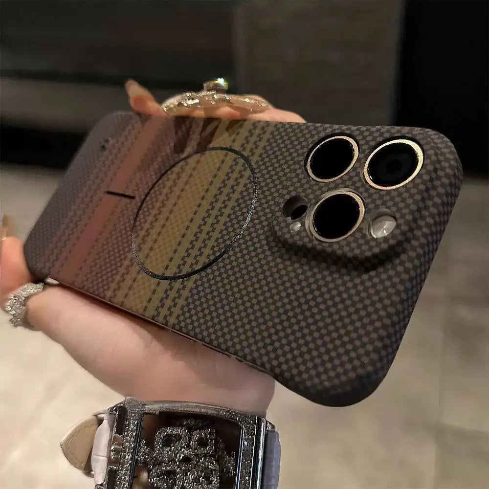A carbon fiber patterned phone case with a MagSafe ring and triple camera cutouts.