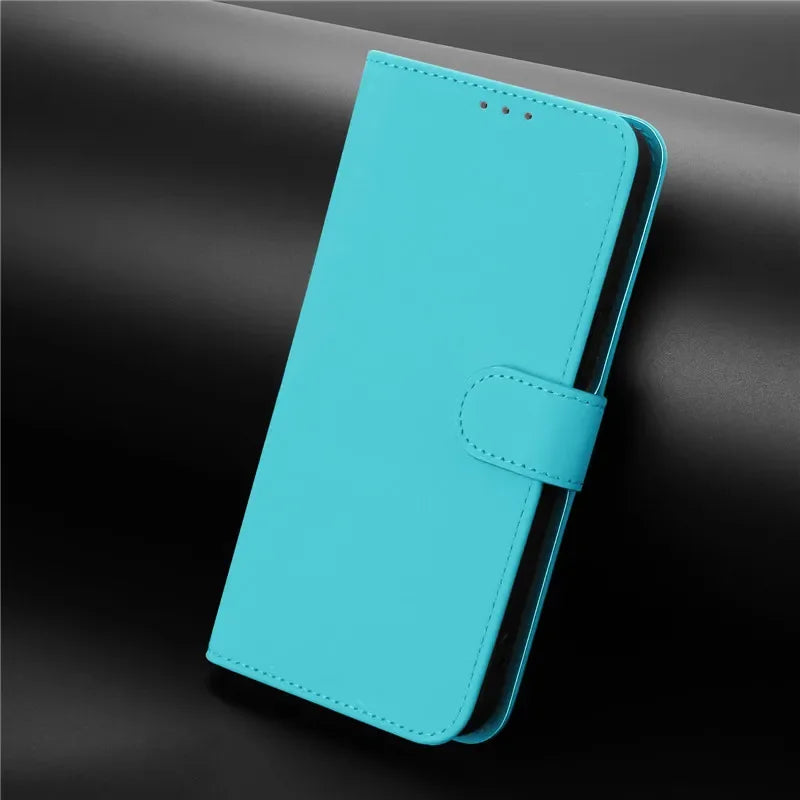 A closed turquoise phone wallet case with a magnetic clasp.