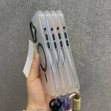 Stack of transparent smartphone cases with MagSafe rings and lanyard attachments.