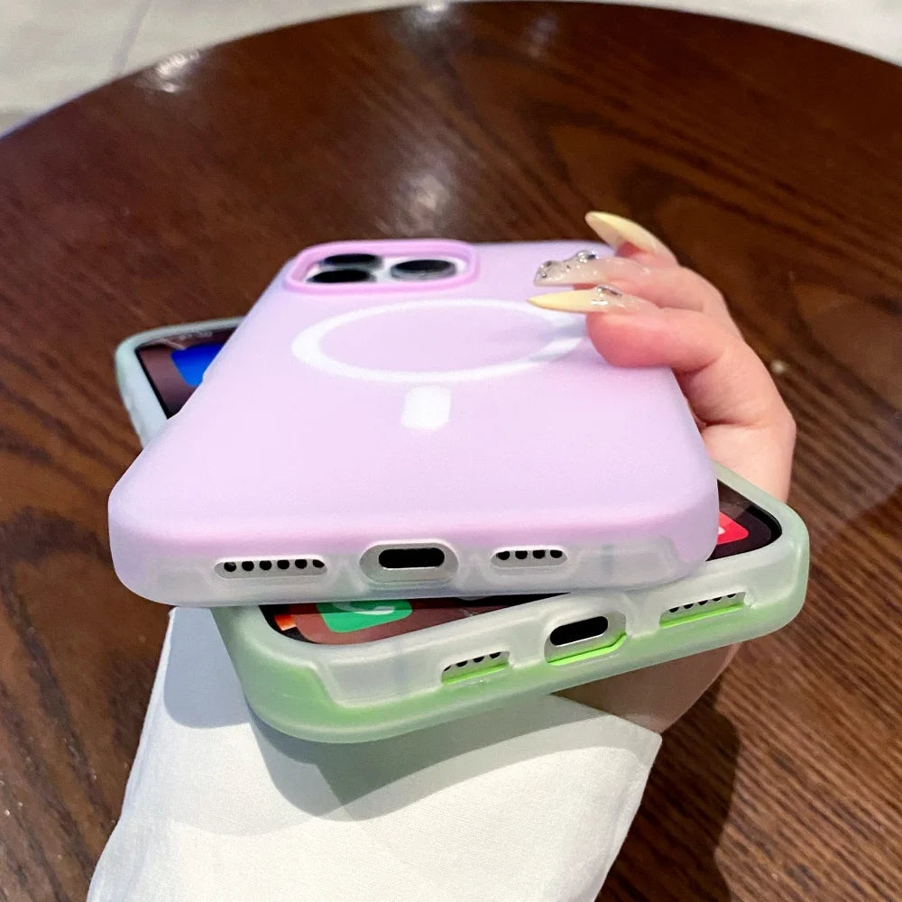 Two silicone phone cases, one lavender and one light green, with MagSafe rings visible.