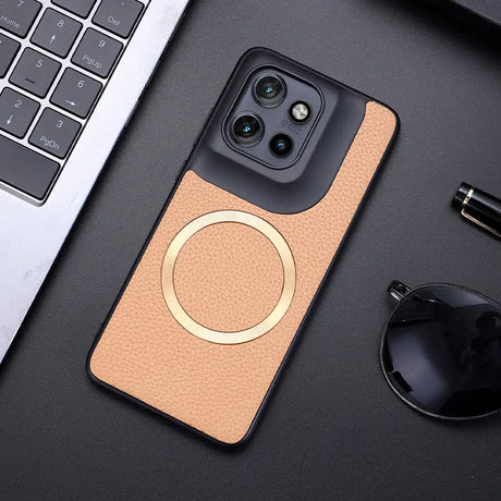 A black and tan leather-textured phone case with a gold magnetic ring and a distinct camera bump.