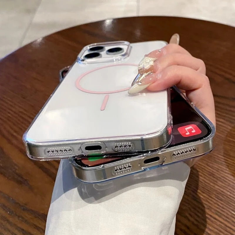 Two clear smartphone cases with silver edges and a pink magnetic ring design.