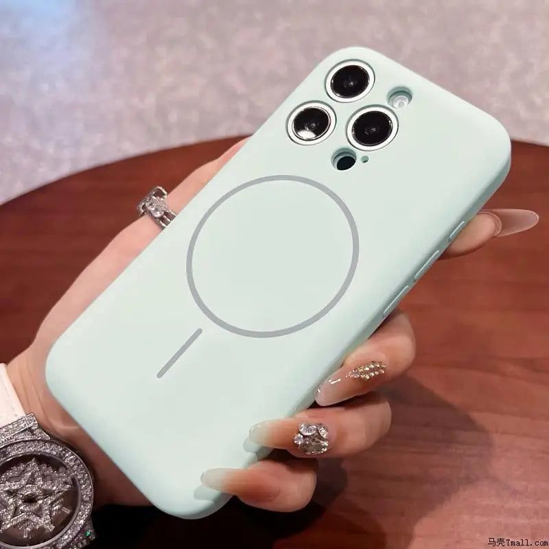 Light blue silicone iPhone case with a Magsafe ring and a triple camera cutout.