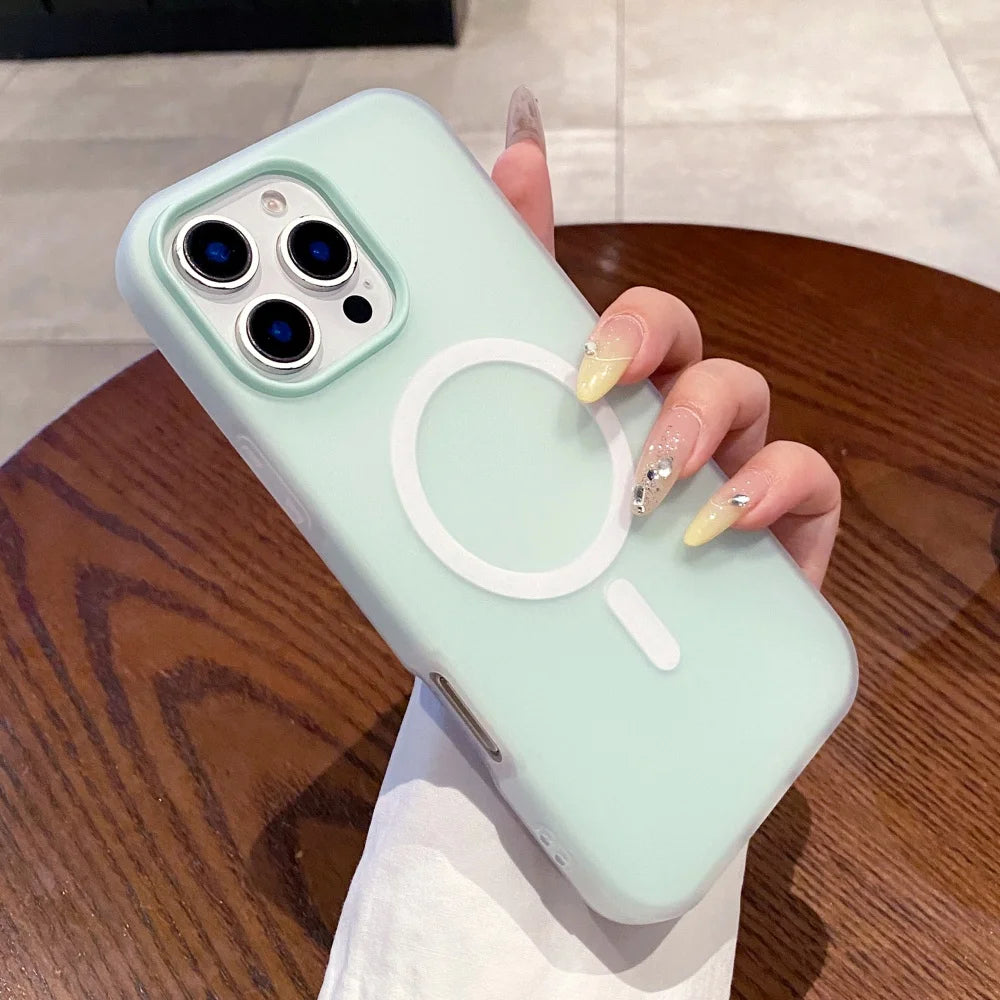 Light mint green silicone iPhone case with a white MagSafe ring.