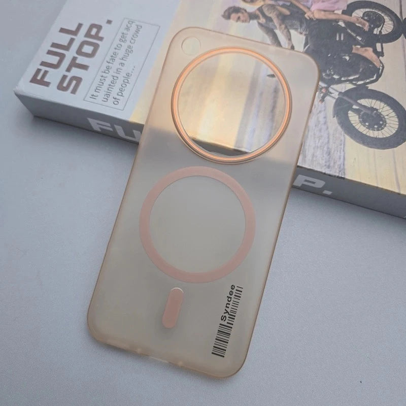 Translucent peach-colored phone case with two pink circular magnetic rings and a matching vertical pill-shaped accent.