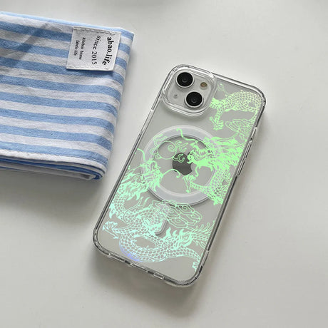 Clear iPhone case with a glowing green dragon design and a MagSafe ring.