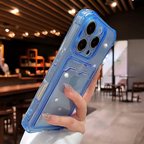 Translucent blue iPhone case with a card holder and decorative pearls.