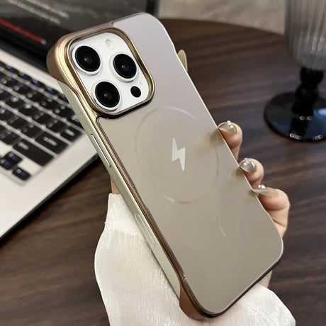 A gold-edged, transparent phone case with a built-in lightning bolt symbol.