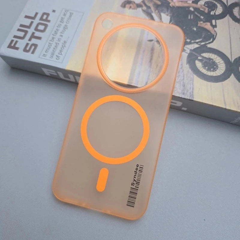 Translucent orange phone case with magnetic charging rings.