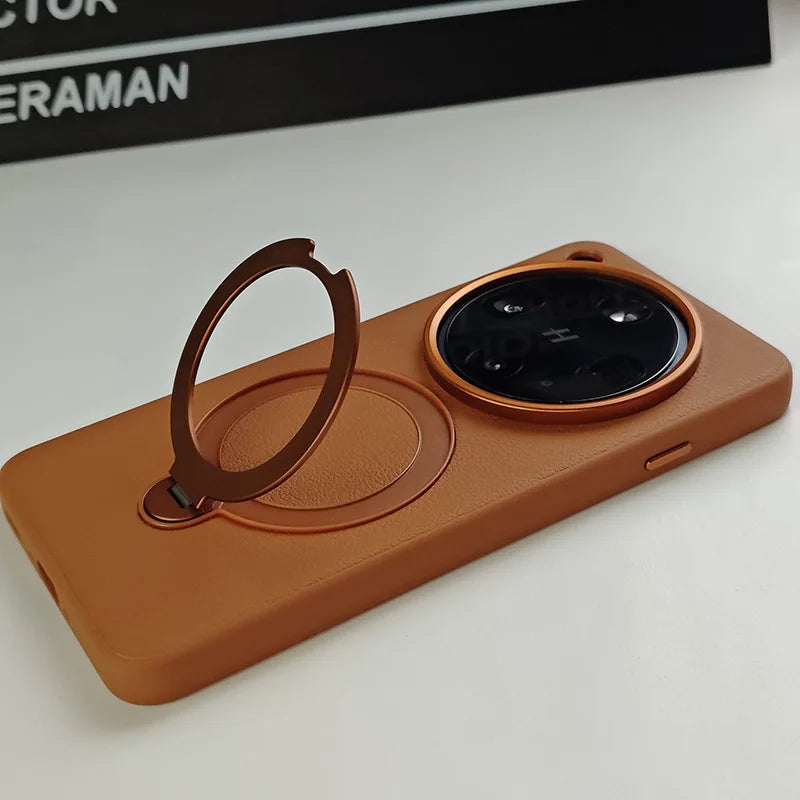 Brown smartphone case with a circular camera cutout and an attached ring holder.