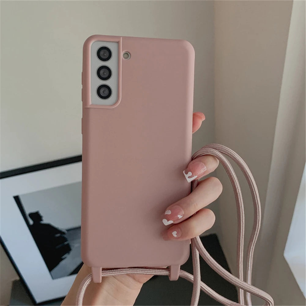 Pink smartphone case with a lanyard.