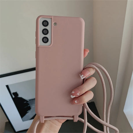 Pink smartphone case with a lanyard.